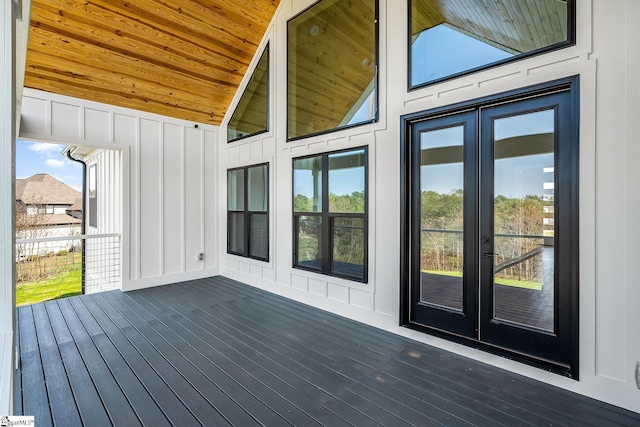 wooden deck featuring french doors