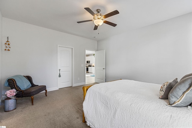 bedroom with carpet, ceiling fan, and baseboards