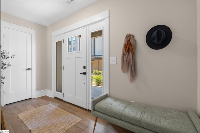 foyer with wood finished floors