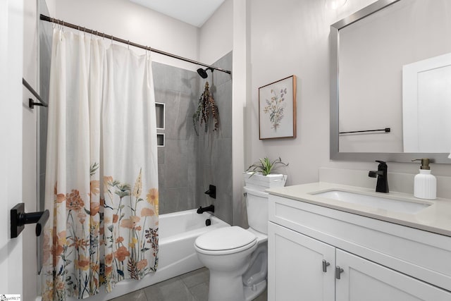 bathroom with toilet, shower / bath combo, and vanity