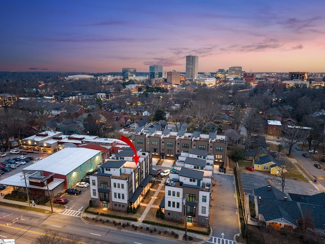 birds eye view of property featuring a view of city