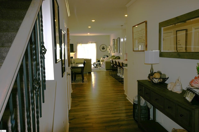 corridor featuring stairway, dark wood finished floors, and recessed lighting