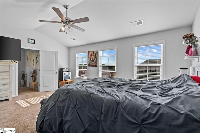 bedroom with light carpet, ceiling fan, lofted ceiling, and visible vents