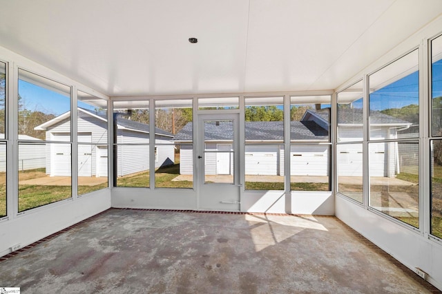 unfurnished sunroom featuring a healthy amount of sunlight