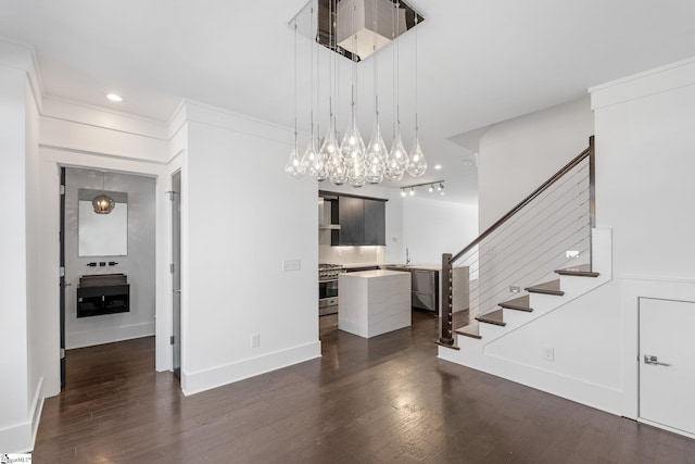 interior space featuring baseboards, dark wood-style flooring, stairs, crown molding, and recessed lighting