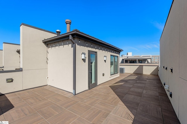 view of patio / terrace with central AC unit