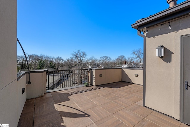 view of patio / terrace with a balcony