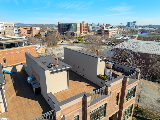 birds eye view of property featuring a view of city