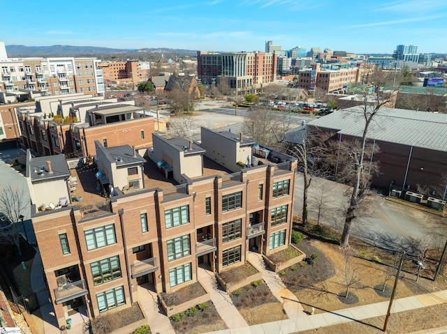 birds eye view of property featuring a view of city