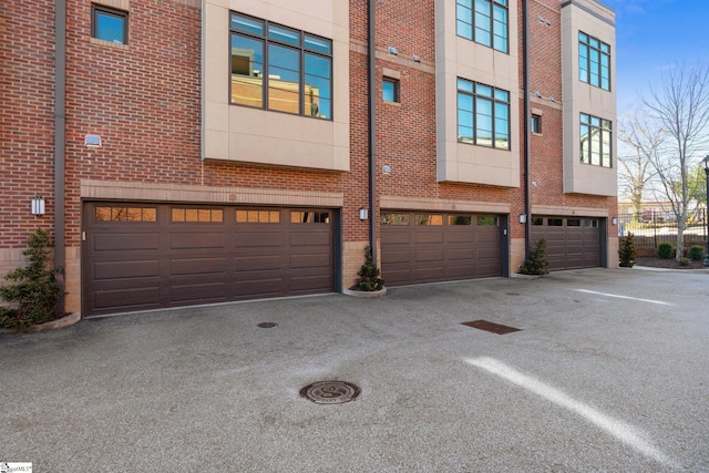 exterior space with an attached garage and driveway