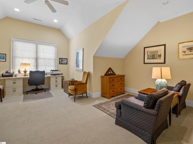 office area with lofted ceiling, baseboards, visible vents, and carpet