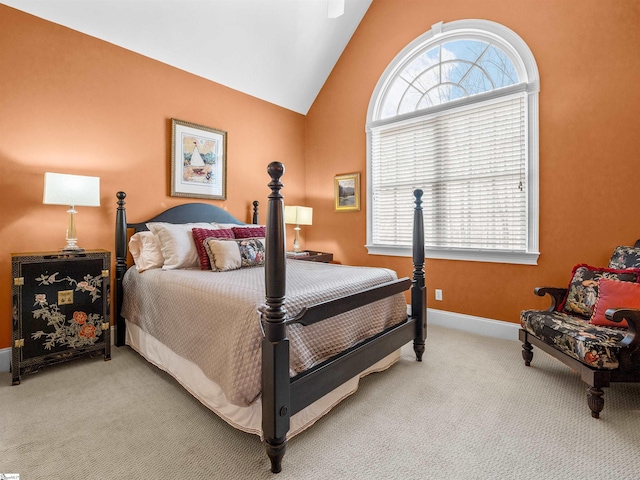 bedroom featuring vaulted ceiling, carpet flooring, and baseboards