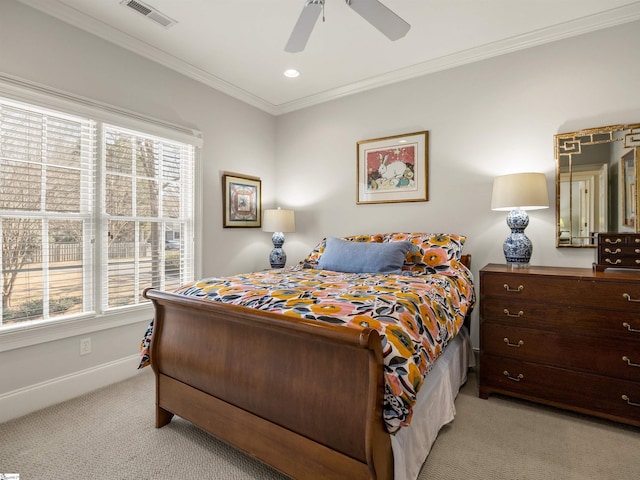 bedroom with light carpet, multiple windows, visible vents, and crown molding