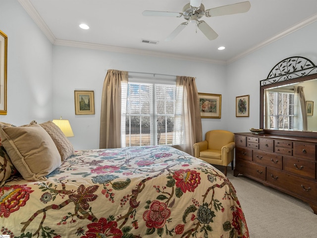 bedroom featuring crown molding, recessed lighting, visible vents, and light colored carpet