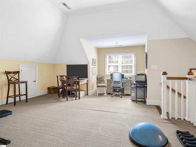 office with vaulted ceiling, carpet, visible vents, and baseboards