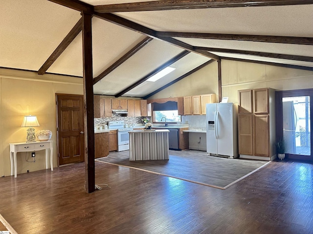 kitchen with under cabinet range hood, white appliances, dark wood-style flooring, and a center island