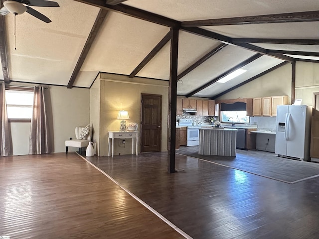 unfurnished living room featuring ceiling fan, dark wood-type flooring, vaulted ceiling with beams, a textured ceiling, and a sink