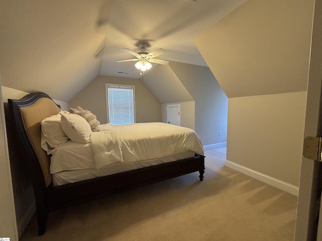 bedroom featuring lofted ceiling, visible vents, a ceiling fan, light carpet, and baseboards