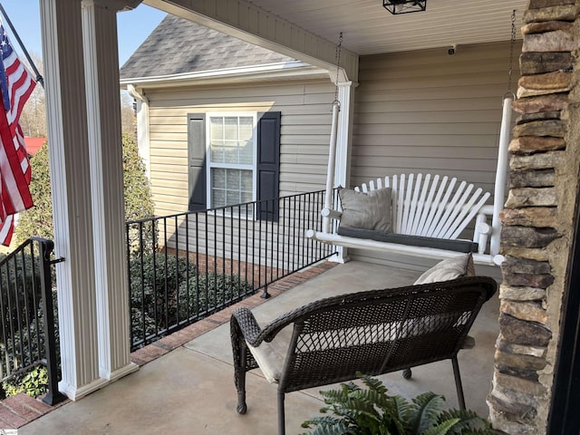 view of patio featuring a porch