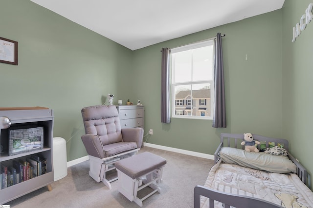 bedroom with carpet and baseboards