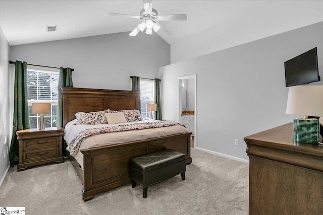 bedroom featuring light carpet, ceiling fan, baseboards, and lofted ceiling