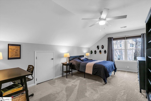 bedroom with lofted ceiling, carpet, visible vents, and baseboards