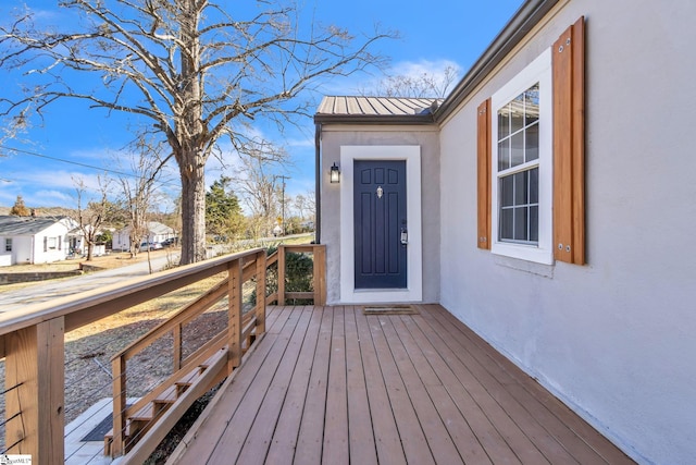 wooden deck with a residential view