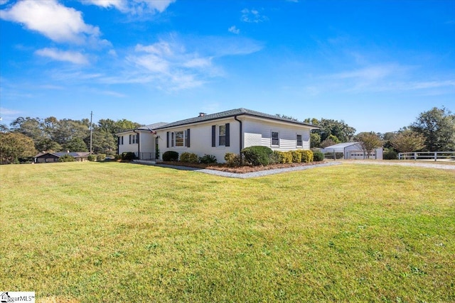 view of front of home with a front yard