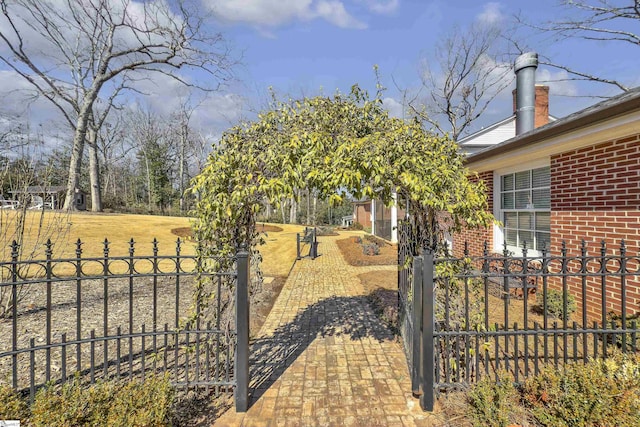 view of yard featuring a gate and fence