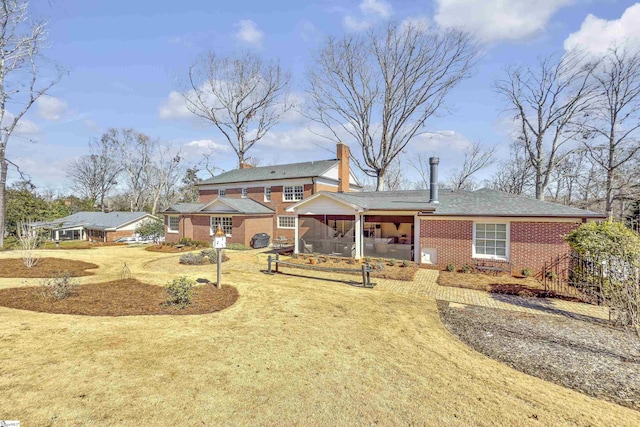 view of front of house with brick siding