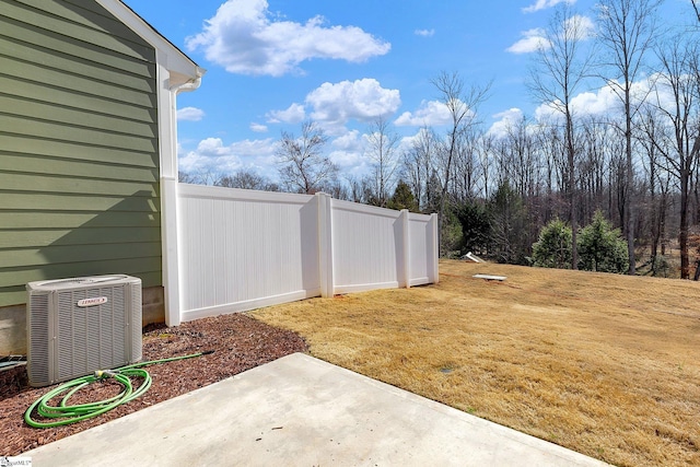 view of yard with central AC