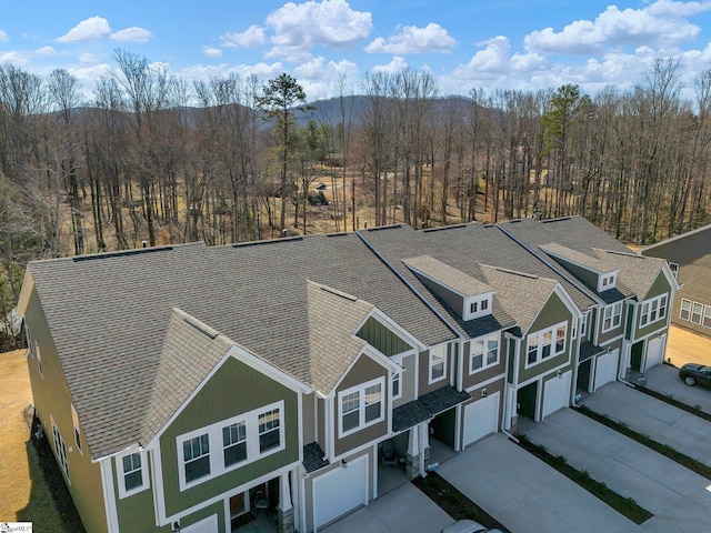 bird's eye view with a view of trees