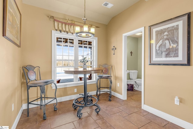 4101 Abbeville Hwy, Anderson, SC 29624 - dining room with a notable chandelier, lofted ceiling, visible vents, and baseboards