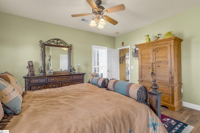 4101 Abbeville Hwy, Anderson, SC 29624 - bedroom featuring a ceiling fan, wood finished floors, visible vents, and baseboards