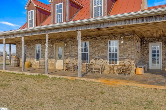 4101 Abbeville Hwy, Anderson, SC 29624 - back of property featuring stone siding, metal roof, and board and batten siding