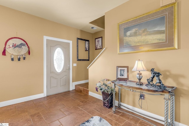 4101 Abbeville Hwy, Anderson, SC 29624 - entrance foyer featuring stone finish flooring, visible vents, and baseboards