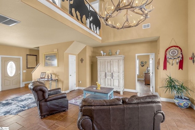 4101 Abbeville Hwy, Anderson, SC 29624 - living room featuring baseboards, a high ceiling, and visible vents