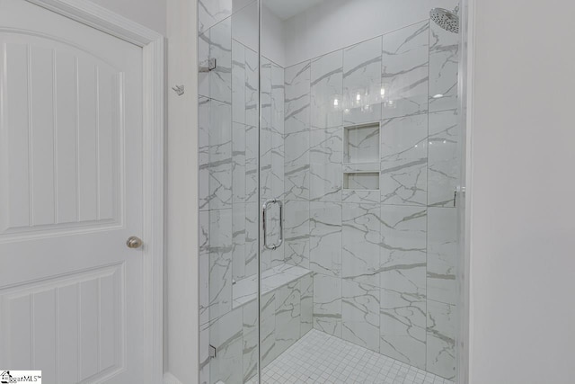 bathroom with a stall shower