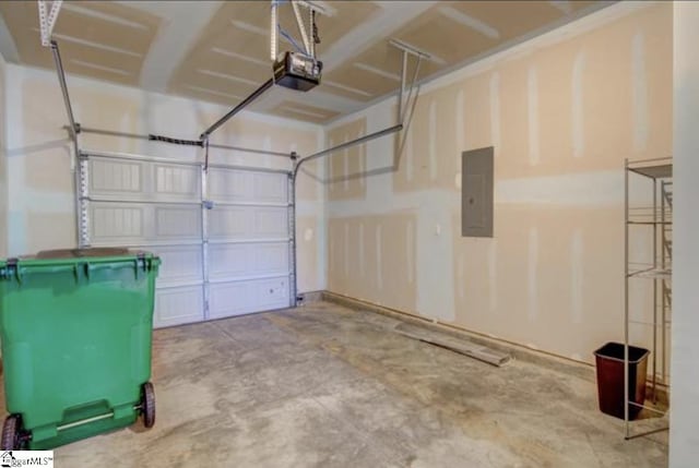 garage featuring electric panel and a garage door opener