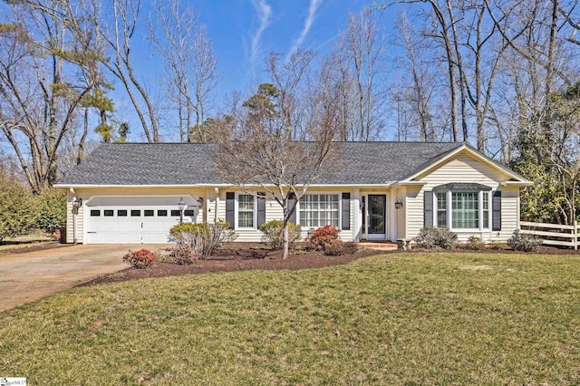 ranch-style home featuring a shingled roof, concrete driveway, an attached garage, fence, and a front lawn