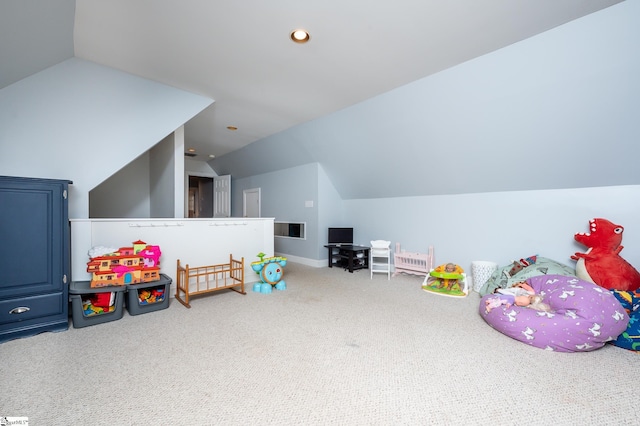 recreation room featuring visible vents, vaulted ceiling, carpet flooring, and recessed lighting