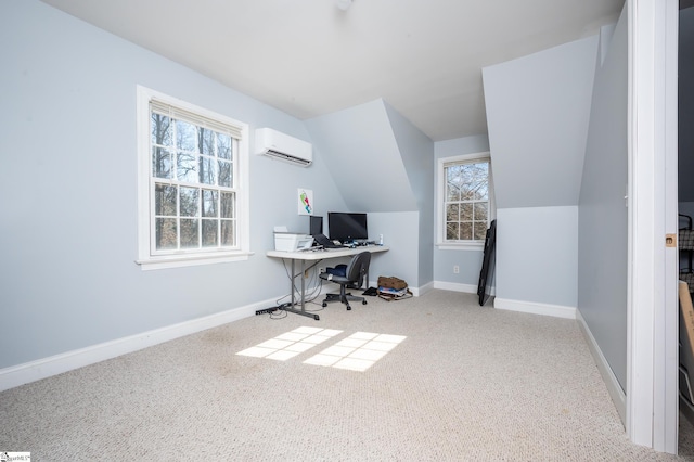 carpeted home office with lofted ceiling, a wall mounted air conditioner, and baseboards