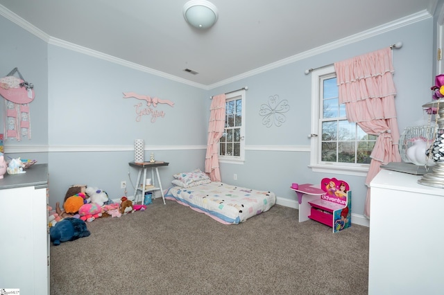 bedroom featuring carpet floors, ornamental molding, visible vents, and baseboards