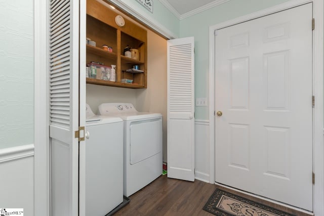 washroom with laundry area, dark wood-style flooring, crown molding, and washing machine and clothes dryer