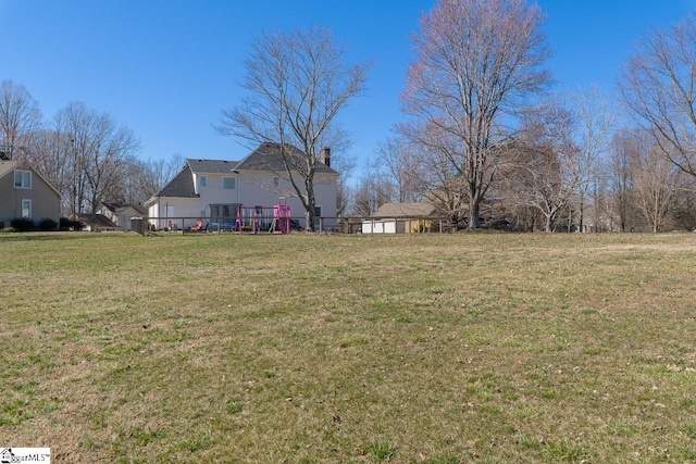 view of yard with a playground