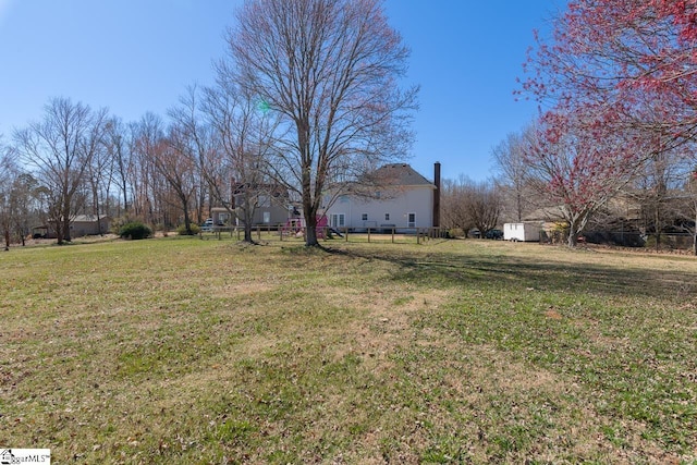 view of yard featuring fence