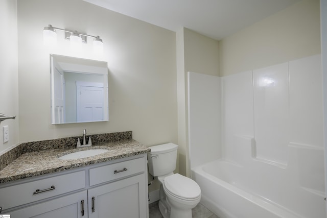 bathroom with toilet and vanity