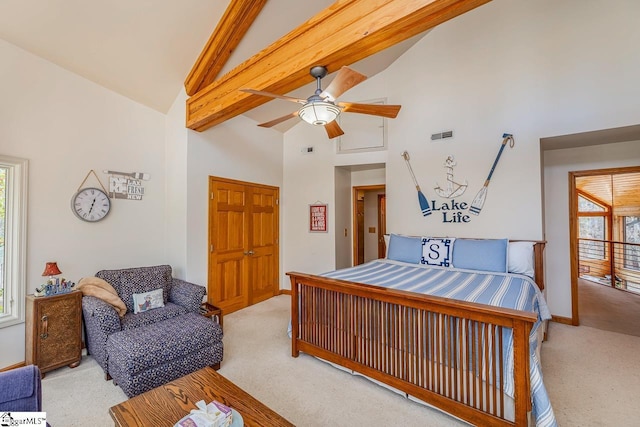 bedroom featuring high vaulted ceiling, beam ceiling, light colored carpet, and visible vents