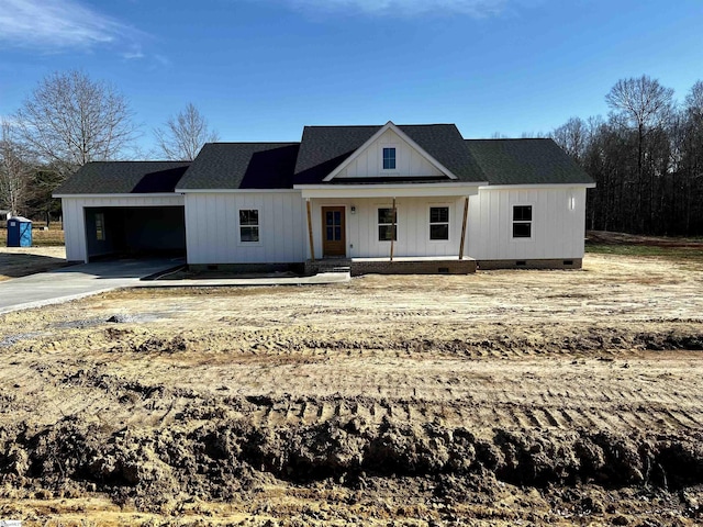 modern inspired farmhouse featuring covered porch, roof with shingles, crawl space, and board and batten siding