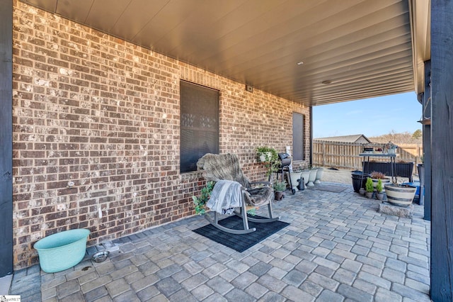 view of patio with fence